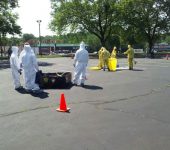 Med-Tex employees in hazmat suits